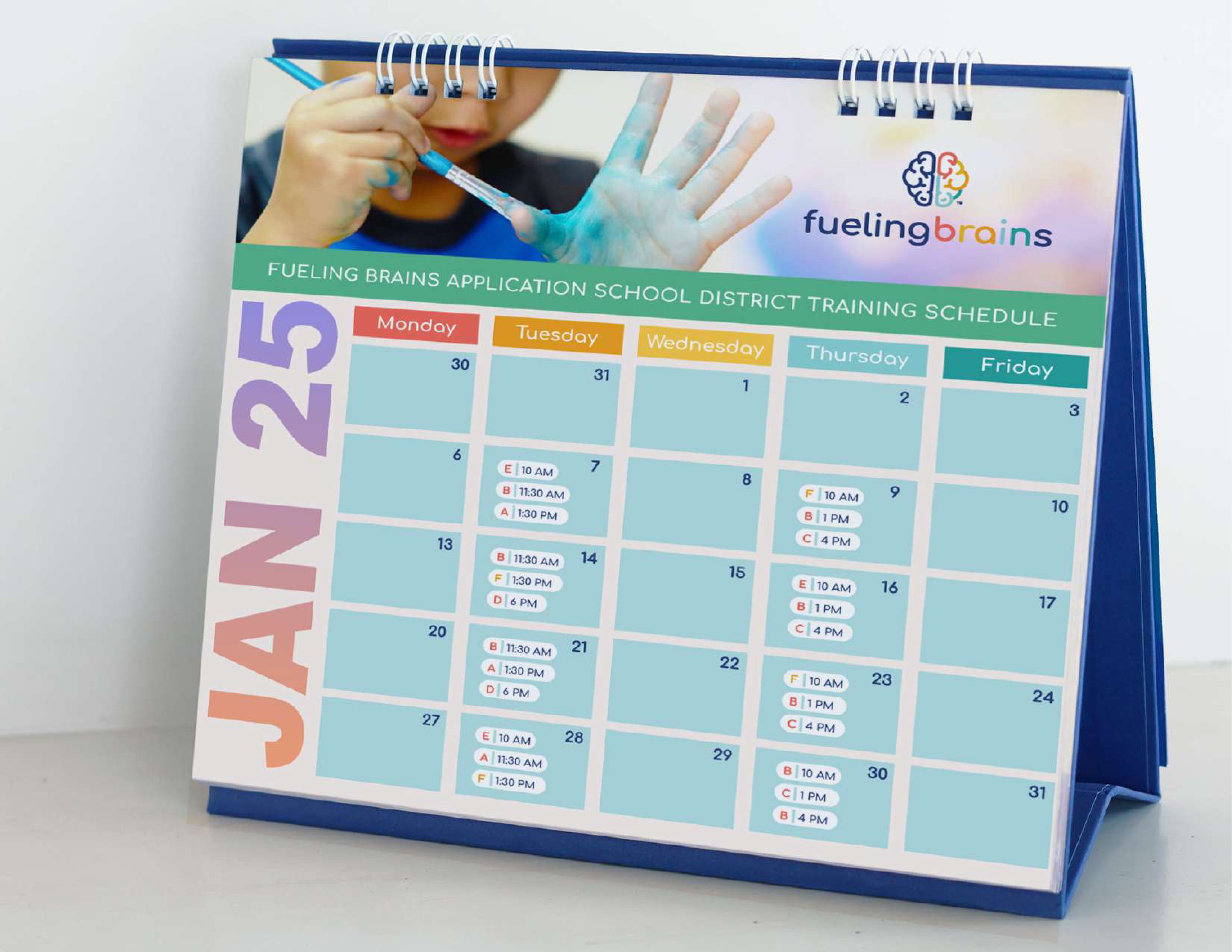 Fueling Brains branded desk calendar — January training schedule