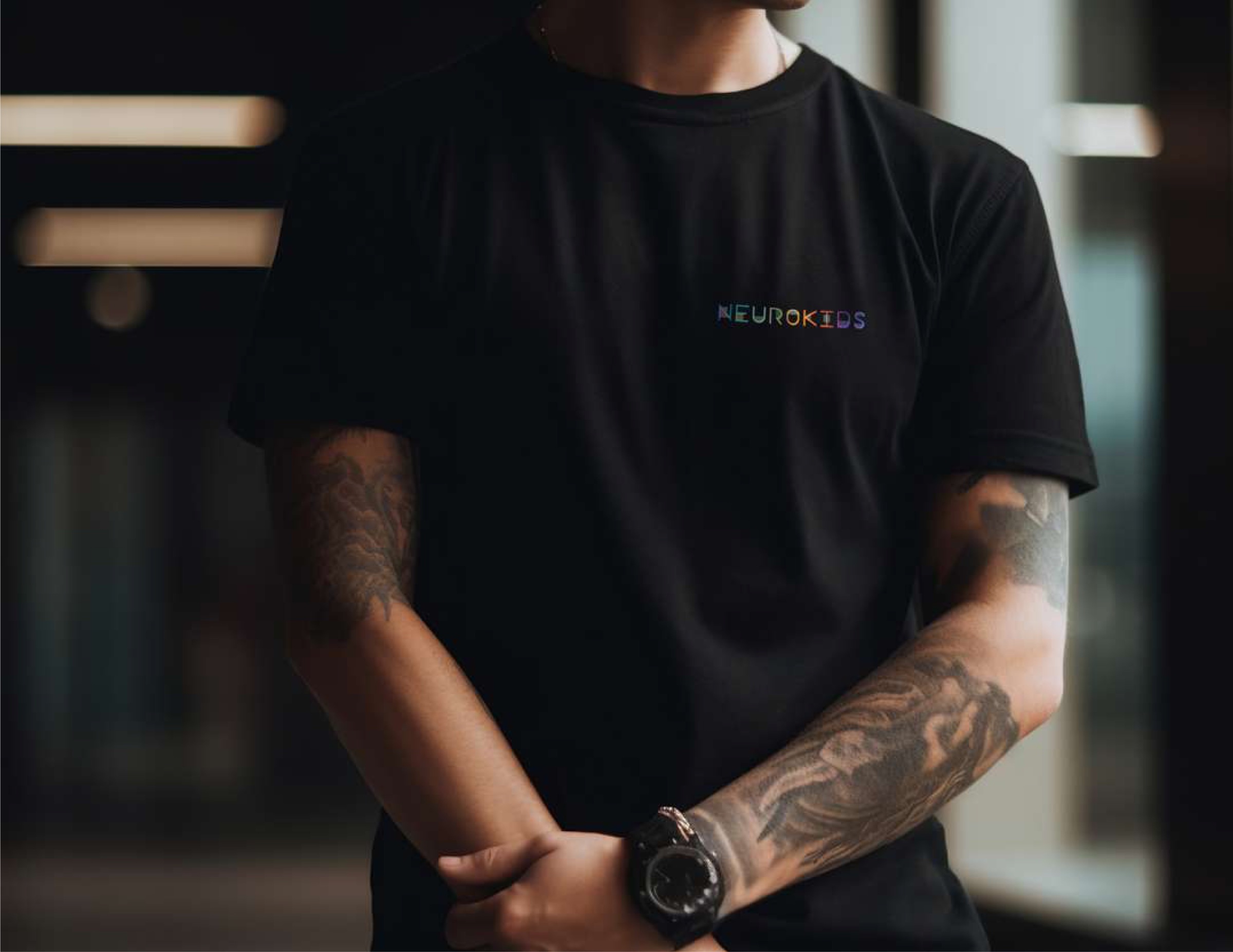 Person wearing Neurokids branded t-shirt