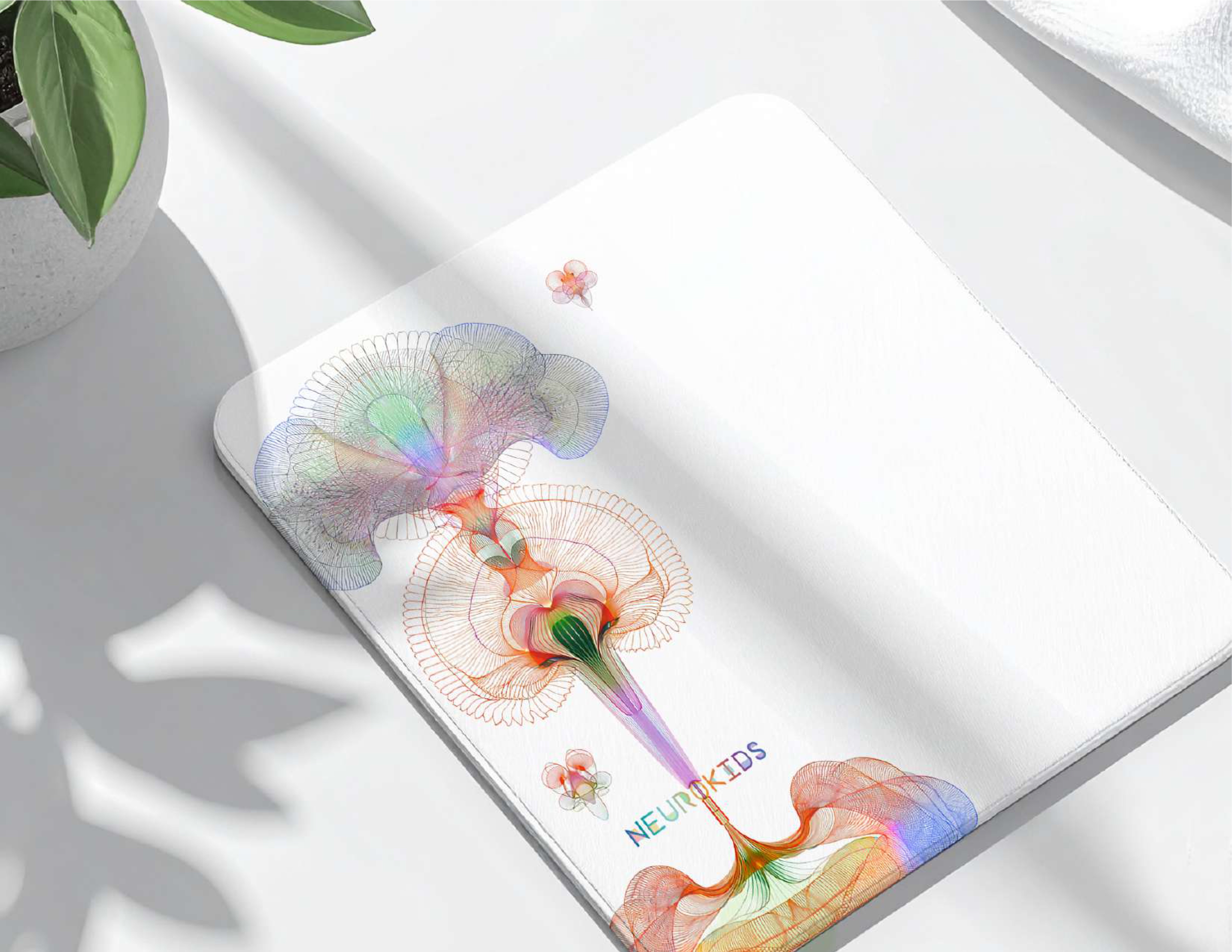 Neurokids 2025 branded notebook with neural botanical illustration