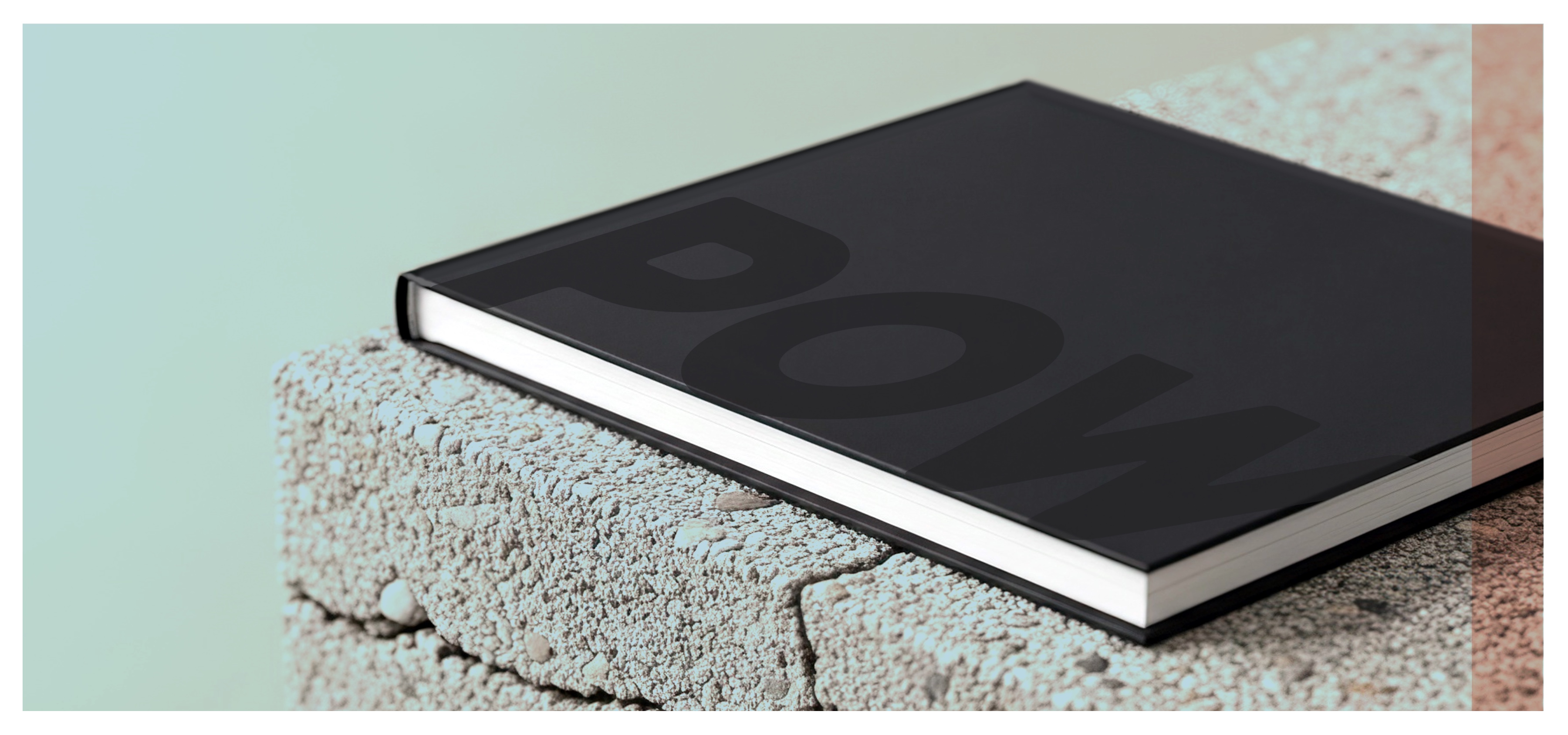 POW brand book pages fanned open, revealing editorial spreads
